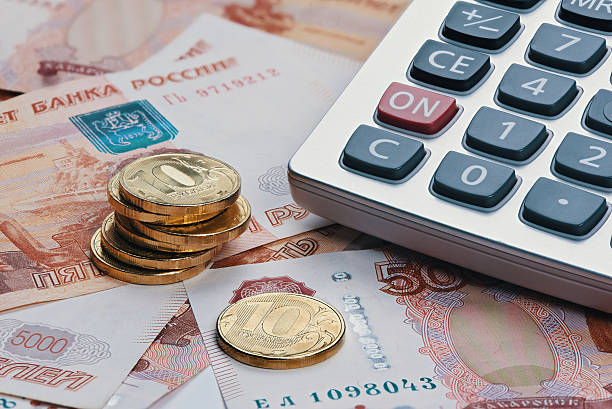 istock Russian ruble currency, money with calculator 625742256