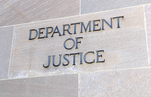 Department of Justice sign, Washington DC, USA Department of Justice sign, Washington DC, USA. Many law enforcement agencies are administered by the DOJ, including the FBI, DEA and Federal Bureau of Prisons fbi photos stock pictures, royalty-free photos & images