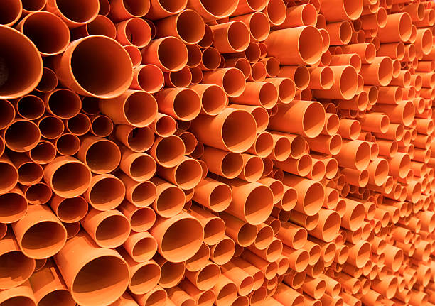 istock PVC pipes stacked in construction site 625754218