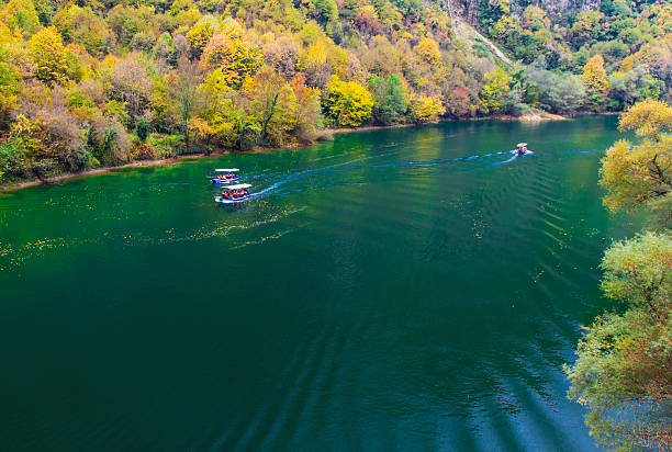 istock Beautiful landscape view with boats on the river 625756002