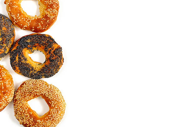 istock Poppy and sesame bagels on a white background 625757320