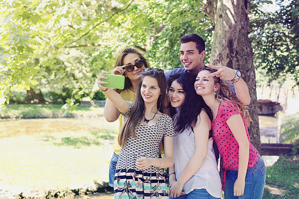 istock Group of happy friends taking a selfie 625758142
