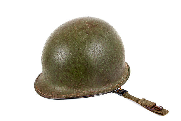 istock Old rusty military helmet with strap isolated on white background 625758162