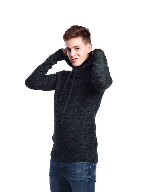 istock Boy in jeans and sweater, young man, studio shot, isolated. 625768520