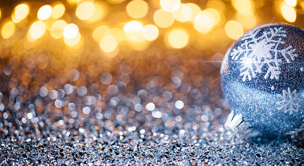 istock Christmas ornament on defocused lights. Decorations Bokeh Blue Gold 625769014