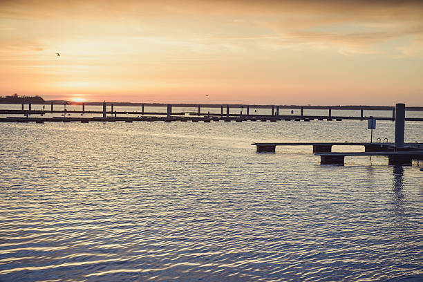 istock Yacht port over orange sunset 625769442