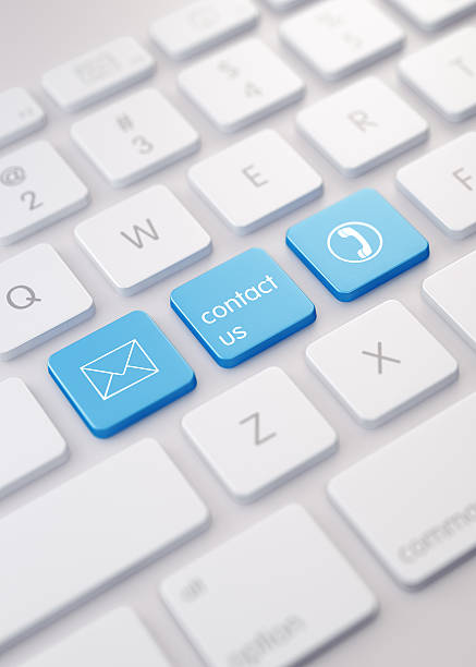 istock Modern White Keyboard wih Blue Colored Contact Us Buttons 625770786