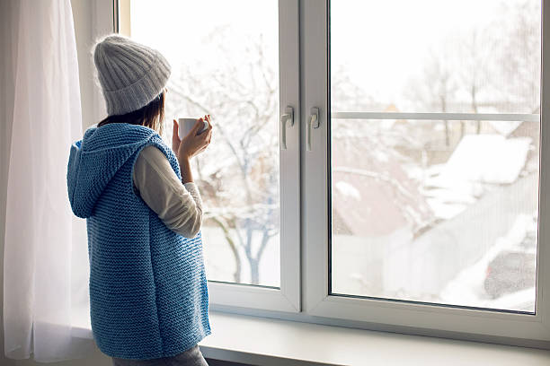 istock girl in a white hat and blue vest 625772362