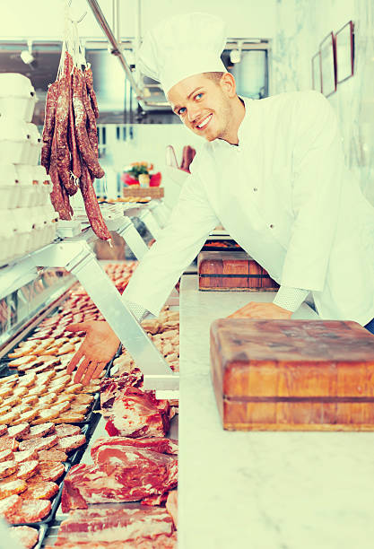 istock happy chief cooking fresh meat 625773672