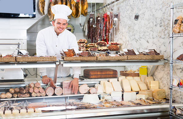 istock Glad professional cook laying out food 625774008