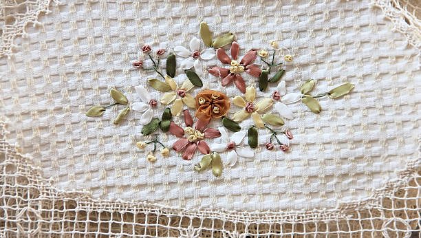 istock fabric with embroidered ribbons for background and texture 625779332