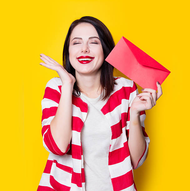 istock girl holding red gift 625779496