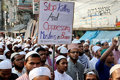 Dhaka, Bangladesh - November 25, 2016: Thousands of Muslim people in Bangladesh take to the streets in capital Dhaka and elsewhere in the country denouncing the atrocities on Rohingya Muslims in Myanmar and urging Bangladesh government to open the border allowing the Rohingya refugees to enter Bangladesh. Persecuted in own country, Myanmar’s ethnic minority Rohingya Muslims kept fleeing to neighbouring Bangladesh.