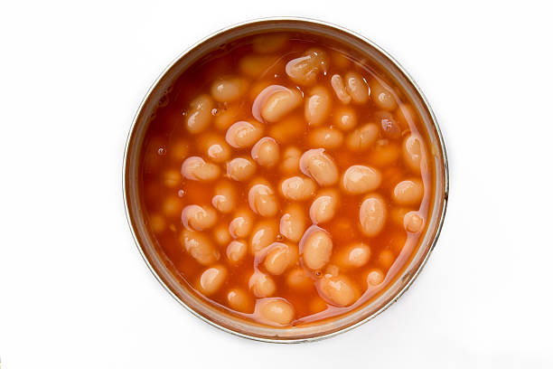 istock Open can of baked beans isolated on white 625785274