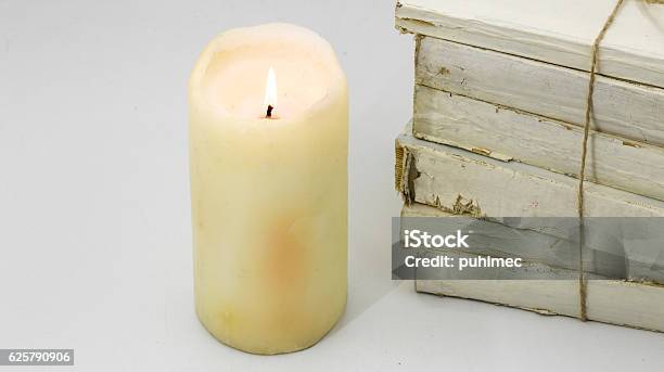 Old Book And Candle Stock Photo - Download Image Now - Backgrounds, Book, Candle