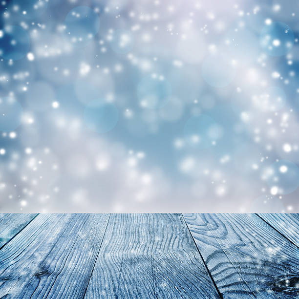 istock Blue christmas background. Snowfall. Wooden planks. 625795206