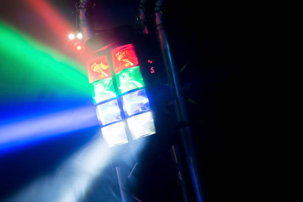 istock Smoky beams of disco light 625795470