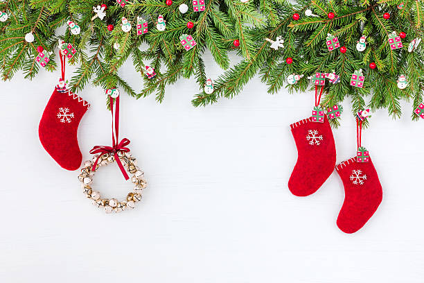 istock Christmas tree, Christmas wreath and red socks on white  background. 625798548