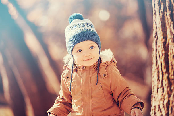 istock Cheerful baby boy having fun outdoors 625799204