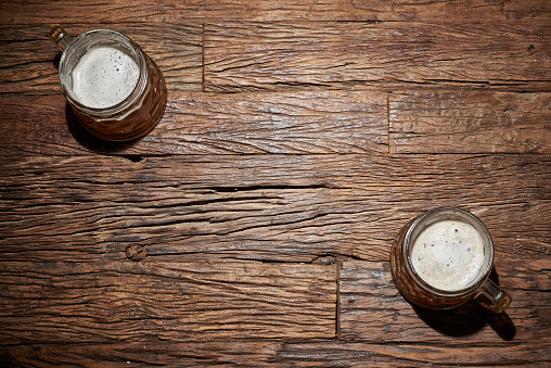 Beer mug on an old wooden table