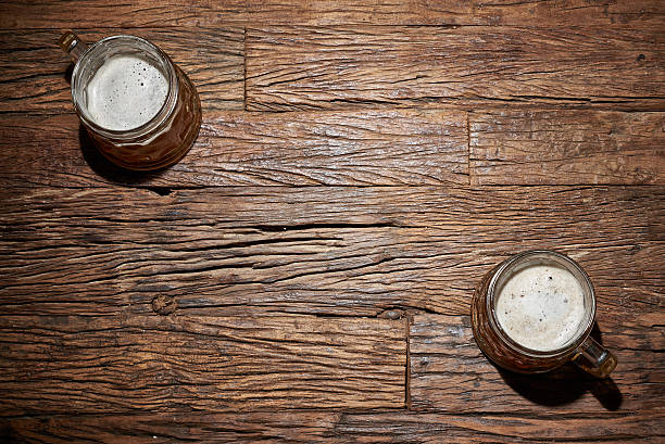 Beer mug Beer mug on an old wooden table open space bar stock pictures, royalty-free photos & images