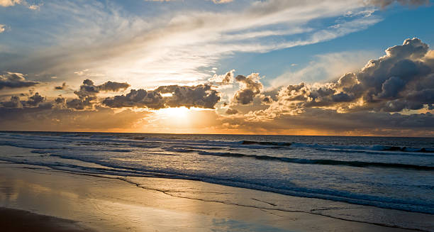 istock Aerial from a beautiful sunset at Vale Figueiras beach in 625801388