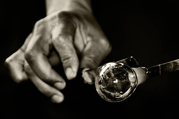 Work of Glass Blower Work of Glass Blower - Glassblower Makes the Sphere hand blown glass stock pictures, royalty-free photos & images
