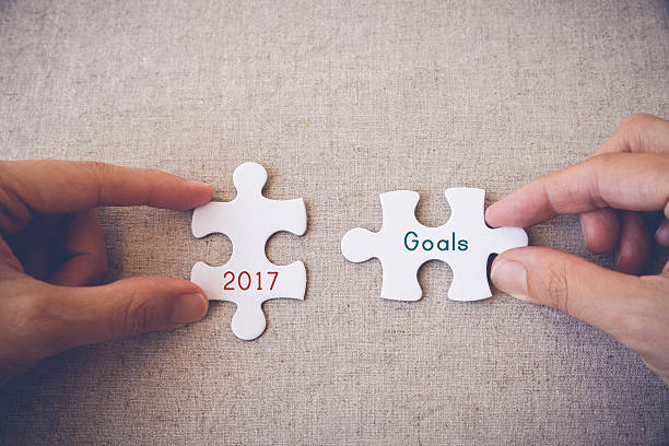 istock Hands with puzzle pieces and 