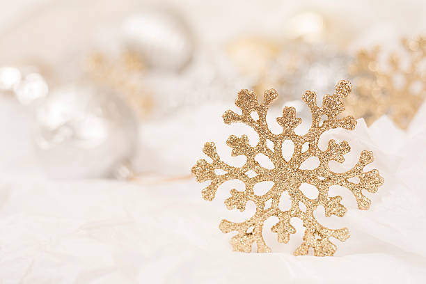 istock Gold Christmas snowflake ornament on white background. 625811298
