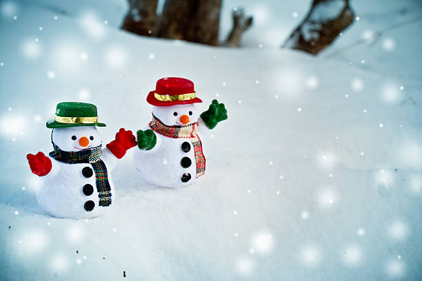 istock Snow man stand among pile of snow. 625811632