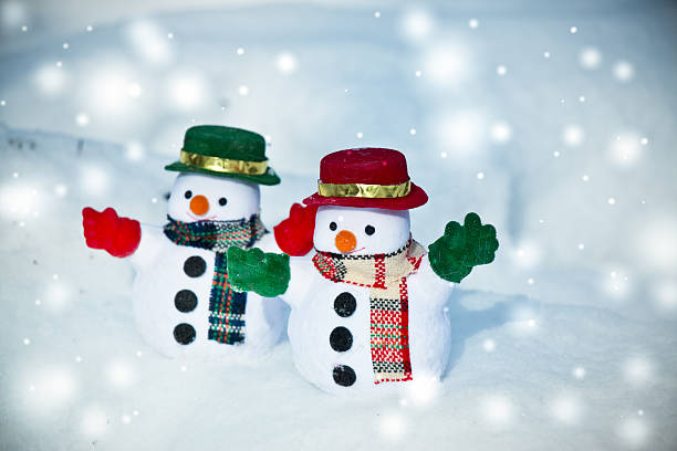 istock Snow man stand among pile of snow. 625811676