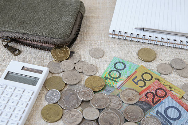 istock Australian money, AUD with calculator, notebook and small money 625812100