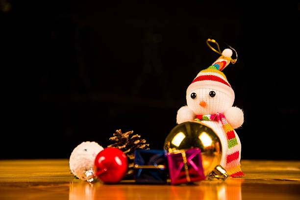 istock Festive snowman with Christmas light background 625812558