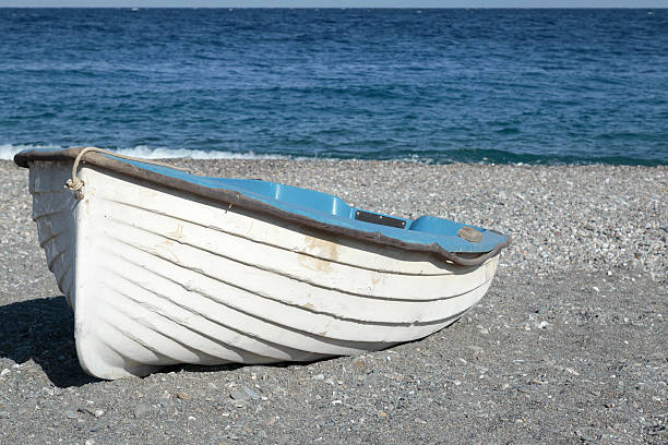 istock Boat on a beach in Sicily 625814160