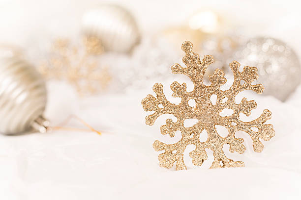 istock Gold Christmas snowflake ornament on white background. 625828950