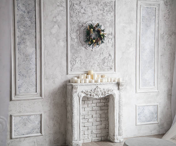 istock Interior with grey fretwork background, fireplace and christmas 625828964