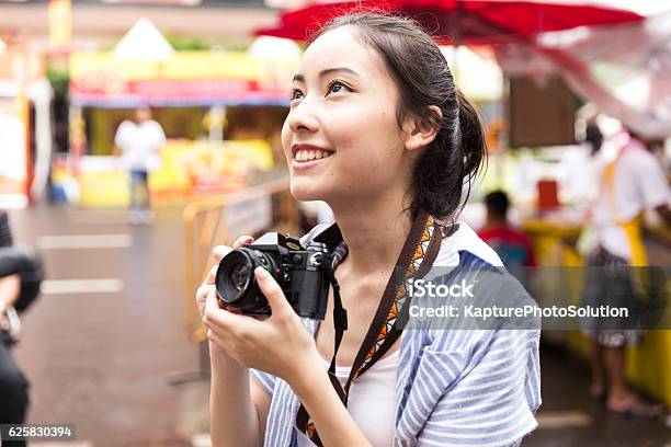 Young Asian Traveler Stock Photo - Download Image Now - Travel, Camera - Photographic Equipment, Japanese Ethnicity