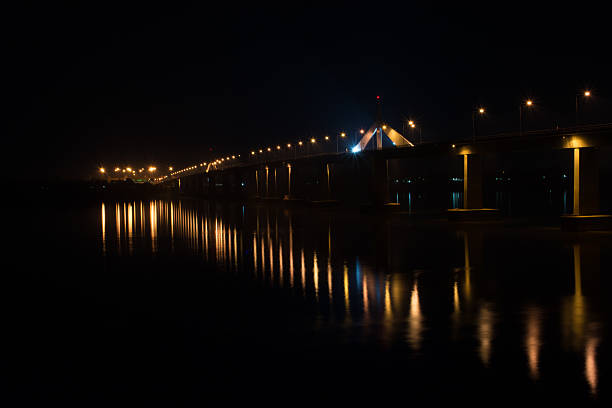 istock Bridge vast pillar of fire and light electric lights lined 625839342