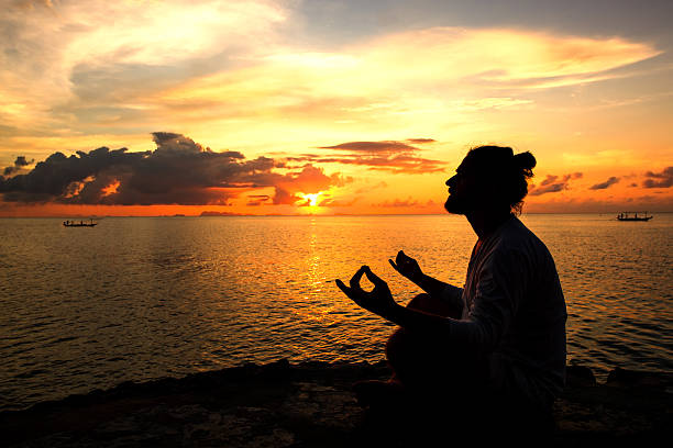 istock Yoga scene silhouette in sunset. 625844438