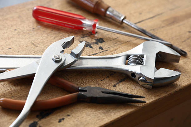 istock tool renovation on grunge wood 625845104