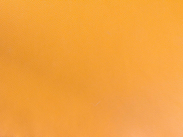 istock The surface of orange vinyl fabric 625851420