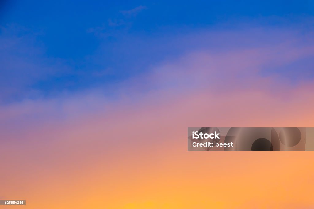 Blurred Sky During Sunset - Gradient Background Blurred Sky During Dramatic Sunset and sunrise- Gradient Background Orange - Fruit Stock Photo