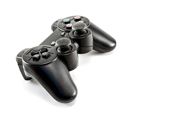 joystick - video game gamepad black isolated on white - fotografias e filmes do acervo