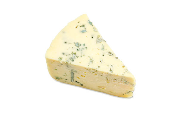 istock Piece of blue cheese on a light background 625862598
