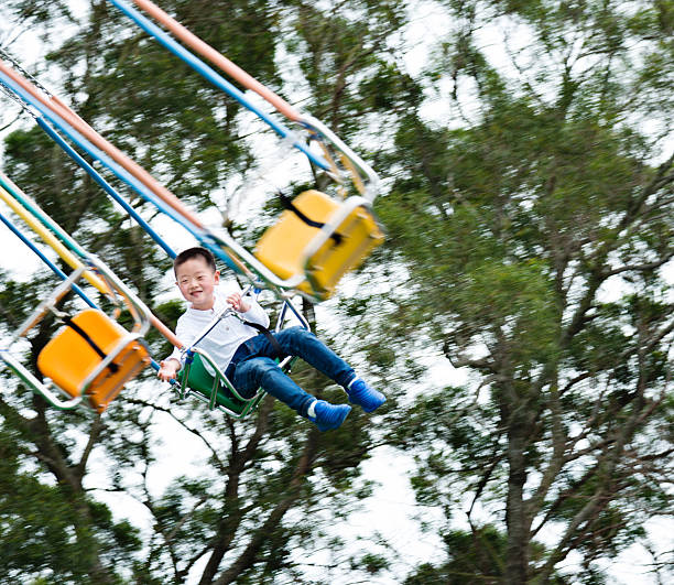 istock Little boy on a swinging ride 625863306