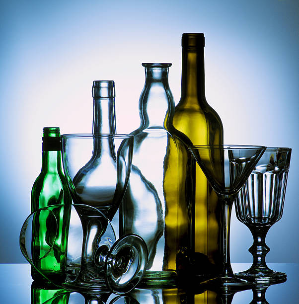 Empty Wine Glasses and Bottles stock photo