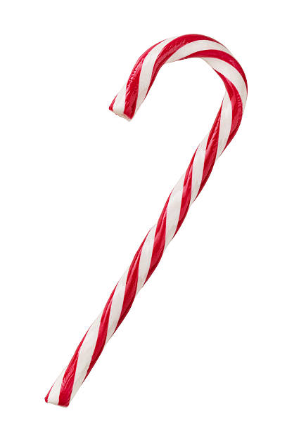 Candy cane isolated on white Close up of candy cane isolated on white background stick plant part stock pictures, royalty-free photos & images