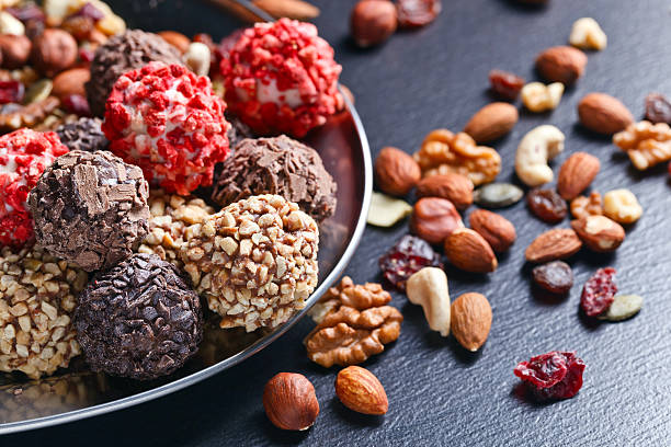istock Homemade candy with chocolate , nuts and dried strawberry 625864396