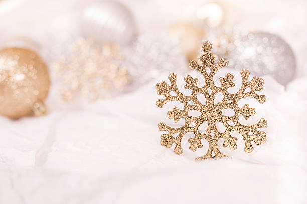 istock Gold Christmas snowflake ornament on white background. 625868936