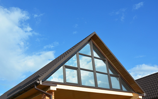 Building house attic conservatory terrace on the home roof. Conservatory or greenhouse roofing.